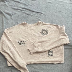 tan coped hoodie with designs